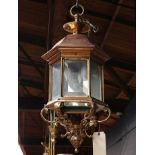 Copper and cast iron exterior lantern, early 20th Century, having a hexagonal copola over the