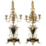 Pair of French Empire gilt bronze and marble candelabra, 19th century, each having a figural