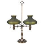 Handel patinated bronze adjustable student lamp, having (2) two light socket clusters, each with a
