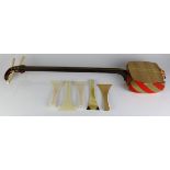 (lot of 11) Japanese three-string instrument, shamisen (damage) and one additional sao (neck),