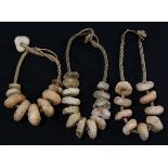 (lot of 3) Indigenous quartzite necklaces, each pierced with disc style beads strung on a knotted