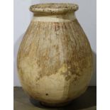 Oversized art pottery vessel having a distressed exterior, 35"h