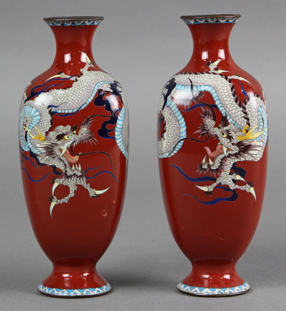 Pair of Japanese cloisonne vases, Meiji period, featuring a three-claw dragon on rounded rectangular