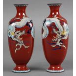 Pair of Japanese cloisonne vases, Meiji period, featuring a three-claw dragon on rounded rectangular