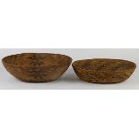 (lot of 2) Antique Mission storage baskets, each having an oval form, one with repeating geometric