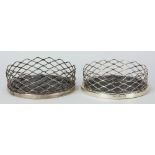 Pair of sterling silver mounted coasters, by Frantz Hiingelberg, Denmark, each set with a pierced