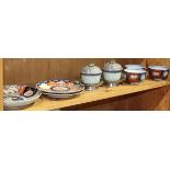 (lot of 8) One shelf of Japanese and Chinese porcelain, including Imari plates, and three cups;