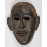 Batak, Indonesia, carved wood mask with polychrome decoration, 10.5"h