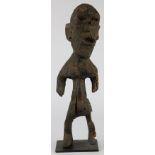 Montol, Northern Nigeria, powerful and abstract standing female figure, showing significant signs of