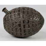 A pipe or a vessel, probably 19th Century, made of a coconut shell with applied metal accents,