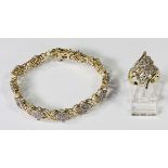 (Lot of 2) Diamond and 10k yellow gold jewelry comprised of one ring, featuring (26) full-cut and (