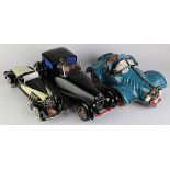 (lot of 3) Model luxury car group, consisting of a ceramic 1931 Bugatti Coupe de Ville Type 41