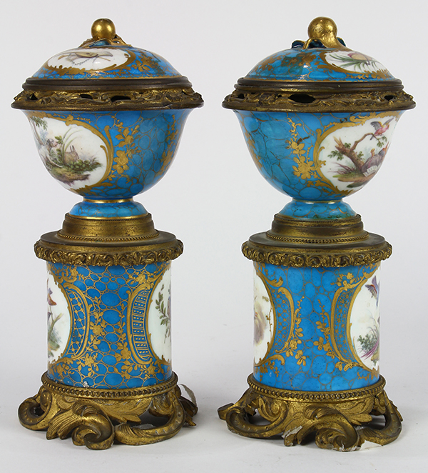 Pair of Sevres style cylindrical lidded urns, each having floral reserves and accented with gilt - Image 2 of 8