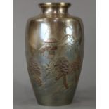 Japanese silver vase, having a short neck above a wide shoulder and ovoid body, overlay cast with