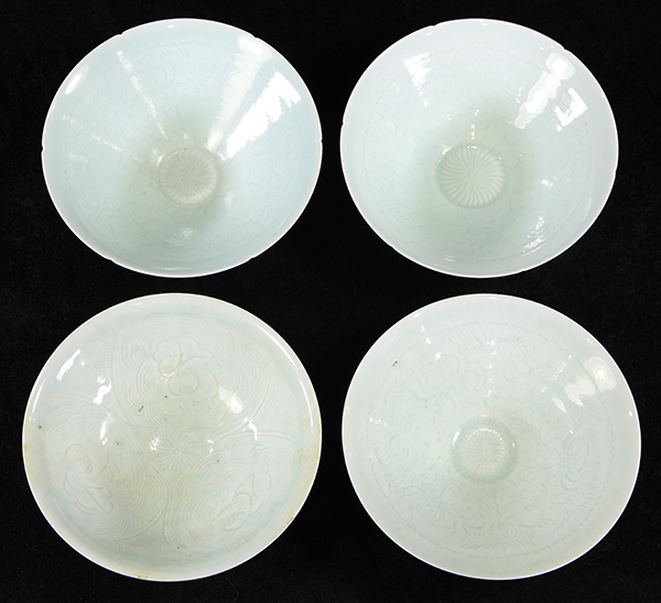 (lot of 4) Chinese yingqing glazed porcelain bowls, each incised with children amid floral