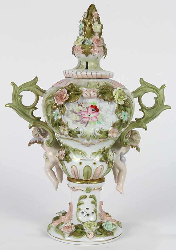 Continental porcelain lidded urn, the baluster form with floral finial flanked by foliate form - Image 2 of 2