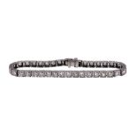 Diamond and platinum straightline bracelet featuring (38) full-cut diamonds, weighing a total of