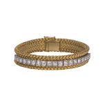 Diamond, platinum and 18k yellow gold bracelet featuring (19) full-cut diamonds, weighing a total of