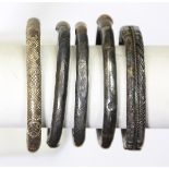 (Lot of 5) Rattan and silver bracelets comprised of three 6.2mm rattan and 2 1/2" silver bangle