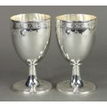 Pair of English George III sterling silver goblets, by Robert Jones, London, 1797, each decorated