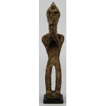 Nepal spring guardian figure with hands clasped in front of chest, Provenance: purchased 2002 from