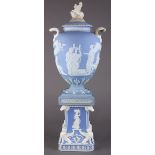 Josiah Wedgwood and Sons lidded jasperware urn on pedestal, the vase, 1782, having a figural