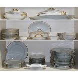 Three shelves of Haviland Limoges table service, distributed by S & G. Gump Co. San Francisco,