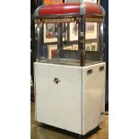 Manley popcorn machine, early 20th century, a commercial theater model, having a glass case with