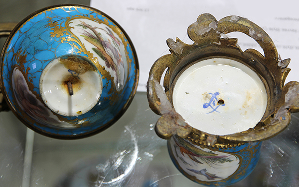 Pair of Sevres style cylindrical lidded urns, each having floral reserves and accented with gilt - Image 6 of 8