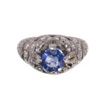 Sapphire, diamond and platinum ring centering (1) round-cut sapphire, weighing approximately 1.45