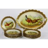 (Lot of 12) French Limoges Fairan Dore pheasant service, consisting of an oval serving platter