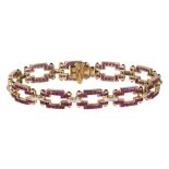 Ruby, diamond and 18k yellow gold bracelet featuring (80) square, (60) rectangular and (4) round-cut