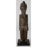 West African seated female maternity figure carved with fine details, 11.5"h