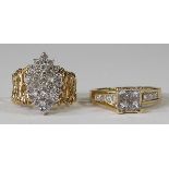 (Lot of 2) Diamond and 14k yellow gold rings comprised of one ring, featuring (30) full-cut