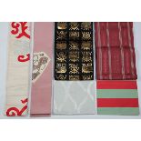 (lot of 6) Japanese traditional silk obi of various styles and sizes, including silver damask and