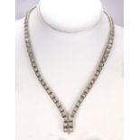 Diamond and 14k white gold necklace composed of two straight line links, featuring (76) full-cut