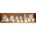 (lot of 17) One shelf with Belleek heart shaped bowls, pitcher, creamers, open sugars, cookie plate,