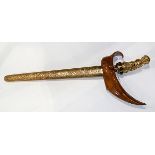 Indonesian kris blade, gold plated demon handle with glass inlay of red and green hue, the yellow