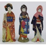 (lot of 3) Japanese clay/ceramic figures, early 20th century, of three young beauties in various