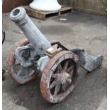 Large Continental patinated metal cannon, having a wheeled base, 56.5"l