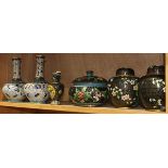 (lot of 6) One shelf of Chinese cloisonne vessels, consisting of three black ground lidded jars; a