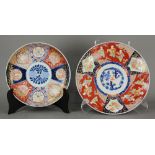 (lot of 2) Japanese Imari chargers: the first, with Three Friends of Winter in blue-and-white and