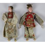 (lot of 2) Chinese dolls, featuring a male and female each in gilt couched silk attire, 11"h