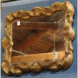 Moderne gilt framed, dimple-textured mirror, 34"l x 27.5"w x 3.5"d