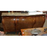 Louis XV style commode, having a shaped marble top, above the case rising on short cabriole legs,