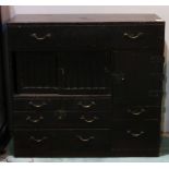 Japanese kodansu cabinet, with a drawer above a hinged door section on the left concealing two