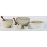 (lot of 12) Antique ceramic mortar and pestle group together with four spheres, largest: 4" x 7.5"w.