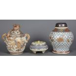 (lot of 3) Japanese Satsuma ware, Meiji period, one lidded jar with dragon finial, having dragon