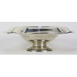 Meriden Brittania sterling silver pedestal center bowl set with an exaggerated everted rim having