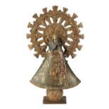 Spanish Colonial Santos figure, 19th century, depicting Madonna, having a large stylized halo, and